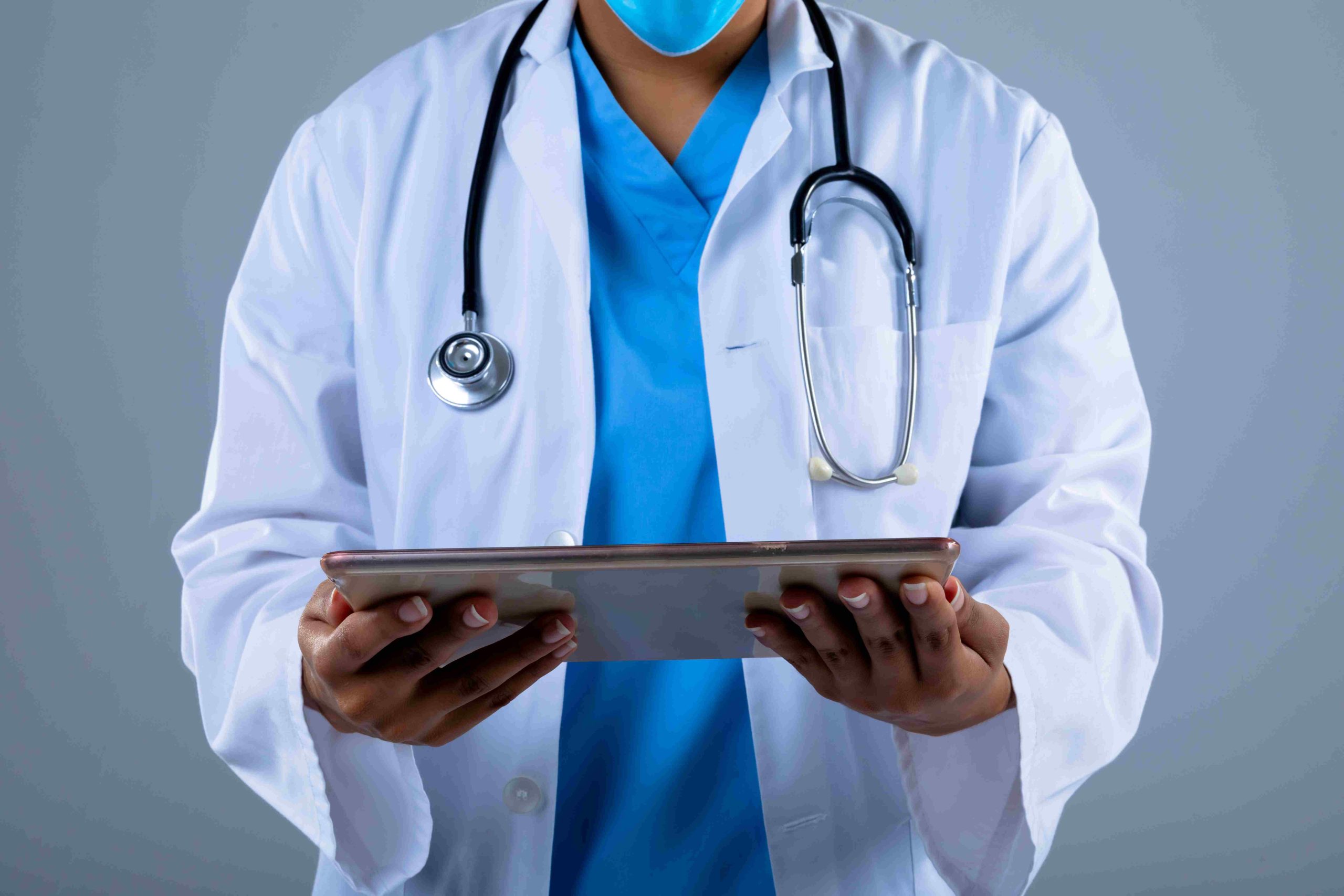 Mid section of female doctor holding digital table 2026 01 09 08 37 24 utc001 scaled