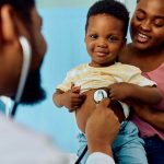 Smiling black boy during medical checkup at pediat 2026 01 06 10 28 02 utc 1001 150x150