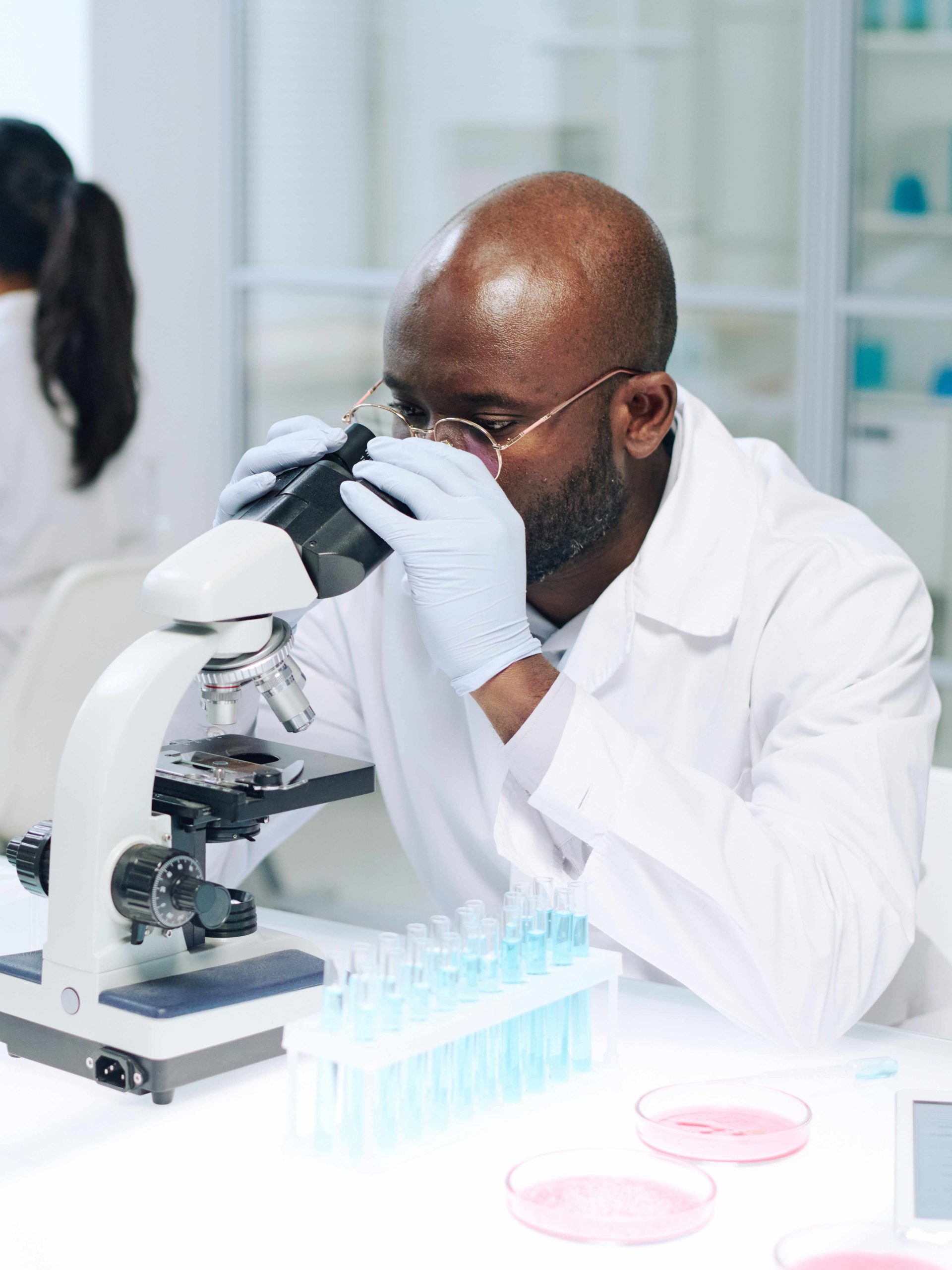 Young male researcher in whitecoat and gloves maki 2026 03 24 13 02 11 utc001 scaled
